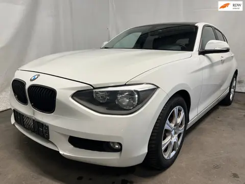 BMW 1-serie 114i EDE Executive - Achterschade - Schade
