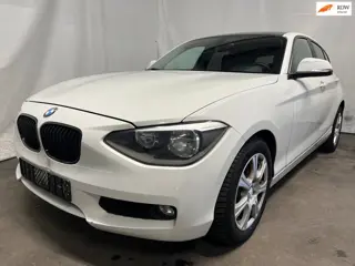 BMW 1-serie 114i EDE Executive - Achterschade - Schade