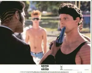 BAND OF THE HAND lobbycard set.