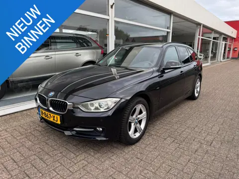 BMW 3-serie Touring 316i High Executive | Panoramadak | Navigatie | Parkeersensoren | Lederen bekled
