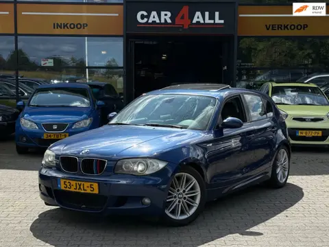 BMW 1-serie 118i High Executive M-PAKKET/DAKJE/MEMORY/PDC/NAVI/APK 22-1-2027