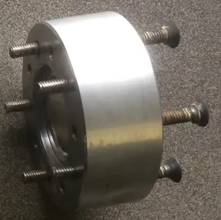 Harley Shovelhead / EVO voorwielspacer met uitsparing voor km teller met kabel