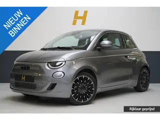 Fiat 500e La Prima 42 kWh | SoH 98,4% | Stoelverwarming | Navigatie | Leder | Lm velgen | All-season