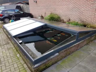Koi vijveroverkapping laten maken?