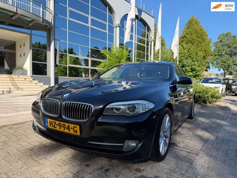 BMW 5-serie Touring 523i High exe aut panorama/leer,navi,boekjes