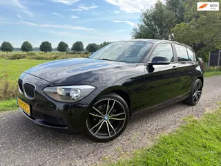 BMW 1-serie 114i EDE High Executive|Stoelverw|ParkSensor|Climate|2014| Zwart