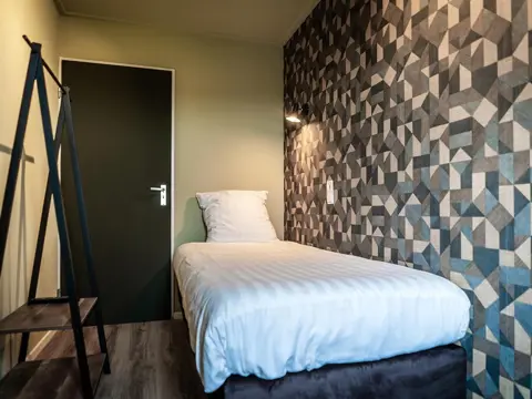 Eenpersoons kamer in sfeervol hotel