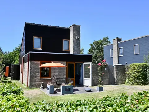 Comfortabel vakantiehuis met grote tuin en patio, vlakbij het Krimbos