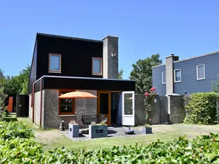 Comfortabel vakantiehuis met grote tuin en patio, vlakbij het Krimbos