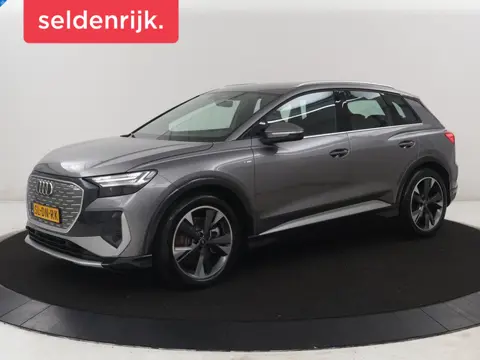 Audi Q4 e-Tron 40 77KWH 150 KW S-Line | SOH 96,3% | Half leder | Adaptive cruise | Stoelverwarming |