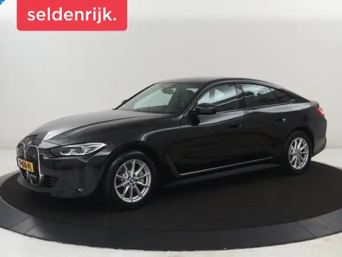 BMW i4 eDrive40 High Executive 84 kWh | SOH 98,7% | Leder | Adaptive cruise | Dodehoek detectie | He