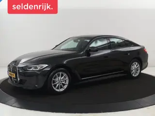 BMW i4 eDrive40 High Executive 84 kWh | SOH 98,7% | Leder | Adaptive cruise | Dodehoek detectie | He
