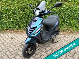 Piaggio Zip 45km Glans Cameleon Alpha LED BETAAL met in3