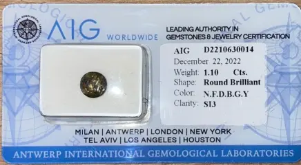 1 pcs Diamant - 1.10 ct - Rond - N (gekleurd) - SI3