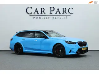 BMW 5-serie Touring M5 INDIVIDUAL RIVIERA BLUE/M DRIVERS PROF/21" LMV/BOWERS & WILKINS/PANO/HUD/ACC/
