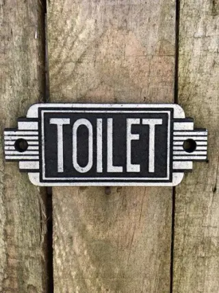Bordje Toilet voor de deur , wc