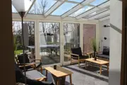 Foto 26 van Sfeervolle woonboerderij met openhaard en grote tuin nabij Oosterend