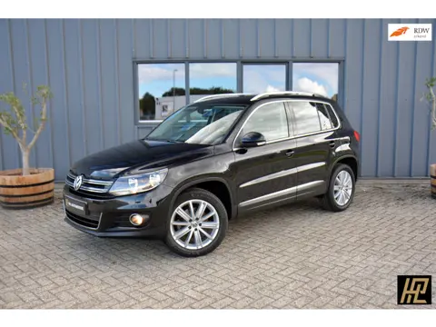 Volkswagen Tiguan 1.4 TSI 160pk Sport&Style * 18" New York * Zwenktrekhaak * Navi * Stoelverwarming 
