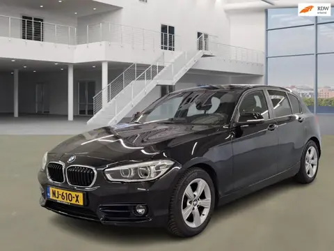 BMW 1-serie 120i Centennial Executive|184PK|ECC|PANO|CRUISE|BLUETOOTH|TREKHAAK|NAVI