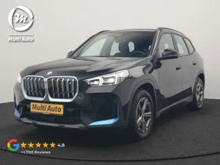 BMW iX1 xDrive30 67 kWh 313pk Dealer O.H. | Trekhaak Af Fabriek | Camera | Adaptief M Onderstel | Vo