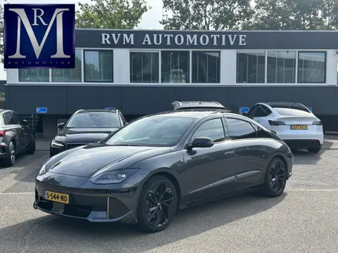 Hyundai IONIQ 6 First Edition AWD 77.4 kWh SOH 100% | PANO | STOEL VERWAMRING VOOR & ACHTER | MEM. S