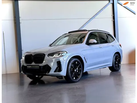 BMW X3 XDrive30e, M-Sport, Adapt. Cruise, Trekhaak, Leer, HUD, 20" Zwart