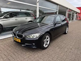 BMW 3-serie Touring 316i High Executive | Panoramadak | Navigatie | Parkeersensoren | Lederen bekled