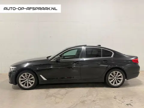 BMW 5-serie 520i Pano Dak Navi Leer Clima Cruise PDC