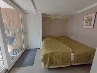 Foto 16 van Vrijstaand vakantiehuis met omheinde tuin en slaapkamer beneden