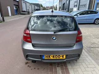 Foto 14 van BMW 1-serie 116i Corporate bj. 2009 met koude airco en nwe APK Rijdt en schakelt prima. Olielampje b