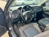 Foto 29 van Mitsubishi Outlander Sport 2.4 Invite Scott 4WD Automaat / NL-Auto / 2e Eigenaar / NAP / APK / Airco