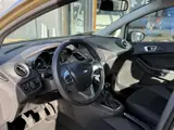 Foto 25 van Ford Fiesta 1.0 EcoBoost Titanium 101PK | Airco | Voorruitverwarming | 5 deurs | Lichtmetalen Velgen