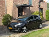 Foto 30 van Ford Fiesta 1.25 Titanium Airco PDC 5-drs Zwart