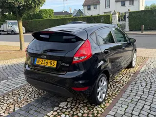 Foto 13 van Ford Fiesta 1.25 Titanium Airco PDC 5-drs Zwart
