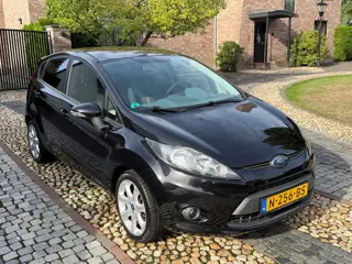 Foto 14 van Ford Fiesta 1.25 Titanium Airco PDC 5-drs Zwart