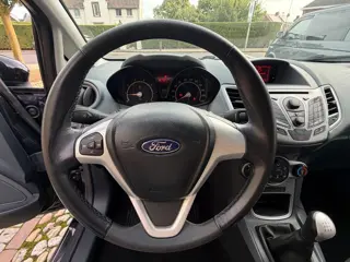 Foto 17 van Ford Fiesta 1.25 Titanium Airco PDC 5-drs Zwart
