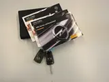 Foto 25 van Opel Corsa 1.4-16V Cosmo GTC, Schuifdak, Stoelvw, LM, Cruise, APK 5-27