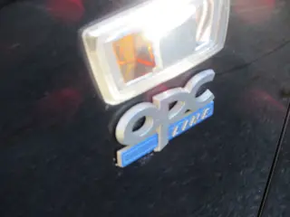 Foto 12 van Opel Corsa 1.4-16V Cosmo GTC, Schuifdak, Stoelvw, LM, Cruise, APK 5-27