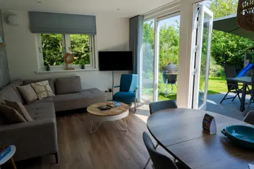 Foto 19 van Stijlvol ingerichte vakantievilla nabij bos en strand
