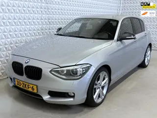 BMW 1-serie 118i Business Airco Cruise Leder Trekhaak Xenon (2012)