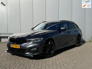 BMW 3-serie Touring 330e xDrive High Executive | Panoramadak | M-Pakket | Elektrische voorstoelen | 