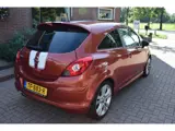 Foto 30 van Opel Corsa 1.4-16V Cosmo/OPC-LINE/AIRCO/NAVIGATIE/CRUISE-CONTROL/PARKEERSENSOREN/STUURBEKRACHTIGING/