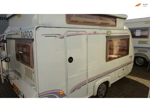 RAPIDO CLUB 32 Evolution 2001 VASTBED Voortent Vaste luifel Hefdak 740 kg