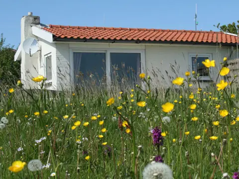 Knusse bungalow aan de rand van de dorpskern