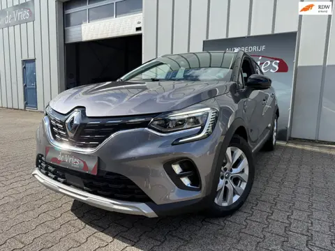 Renault Captur 1.6 E-Tech Plug-in Hybrid 160 Intens / Airco / Navi / Cruise control / Keyless / Trea