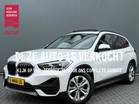 BMW X1 BWJ 2021 xDrive25e 221 PK Business Edition Plus AUTOMAAT | TREKHAAK | PANORAMADAK | STOELVERW