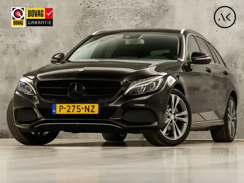 Mercedes-Benz C-Klasse 180 AMG Sport Automaat (GROOT NAVI, LEDER, STOELVERWARMING, GETINT GLAS, SPOR