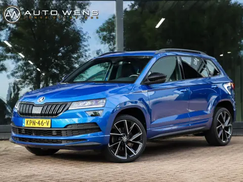 Skoda Karoq 1.5 TSI Sportline 150PK DSG Camera ACC Navi Stoel/Stuurverw. Race Blue 19 inch