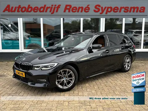 BMW 3 Serie Touring 318i High Executive Edition | M Pakket | Shadow Line | Assisted Driving | Trekha