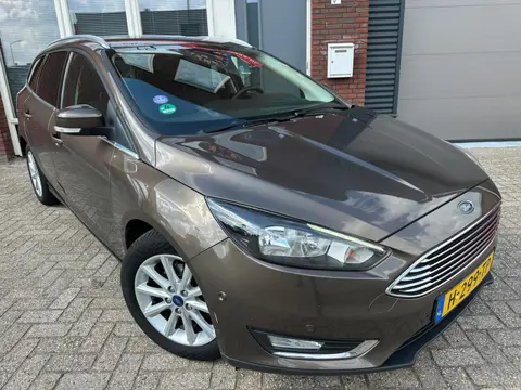 Ford Focus Wagon 1.0 Titanium Edition / Navi / PDC / Park assist / Stoelverw / LM / Clima / Cruise